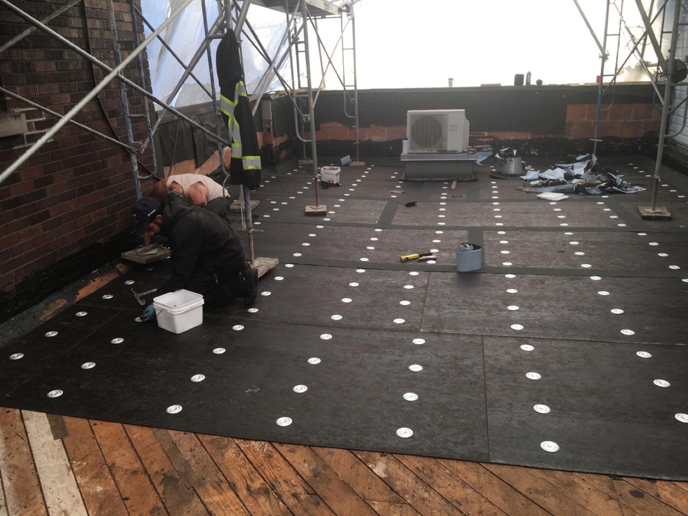 Crew working on a flat roof